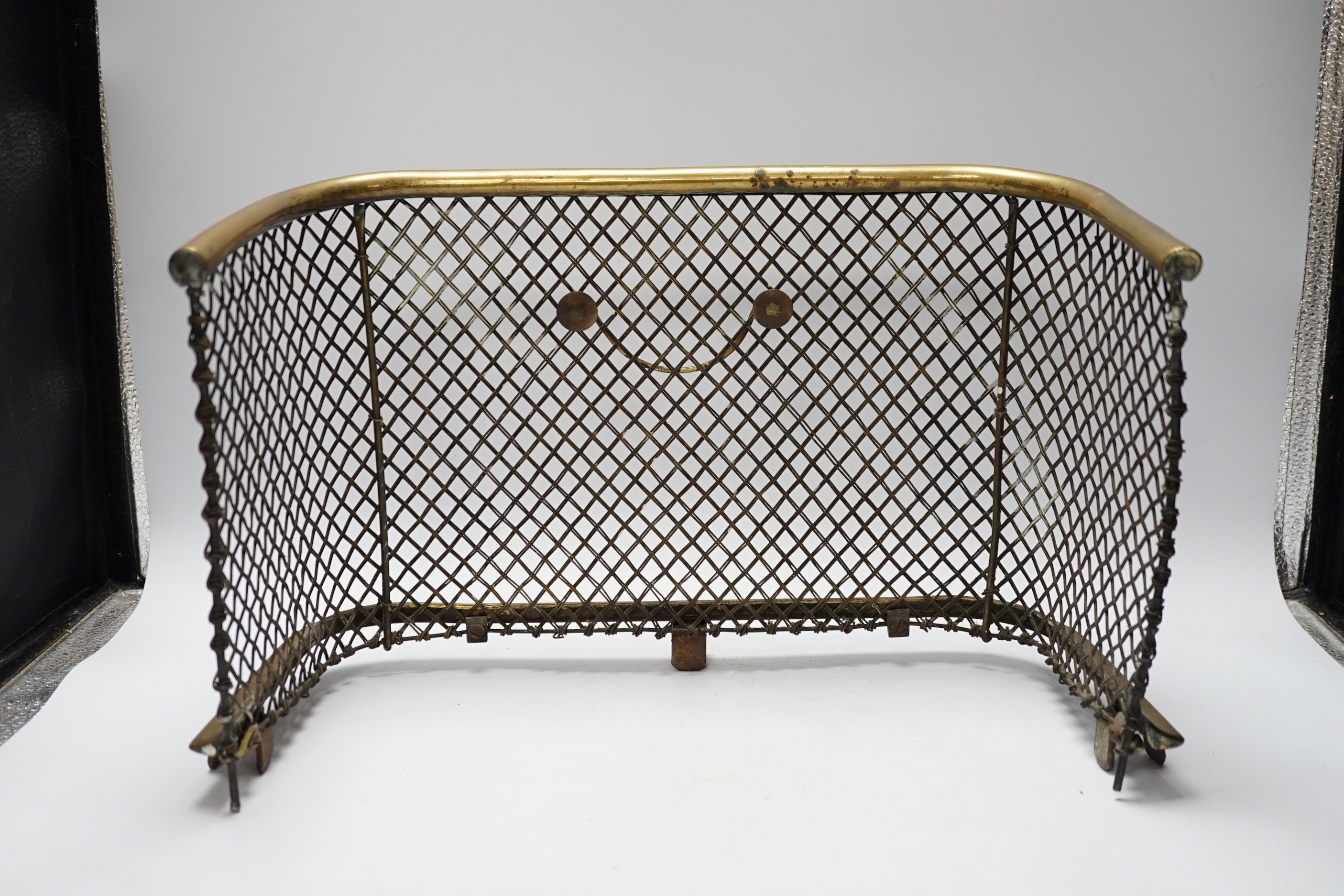 A Victorian small brass fireside fender, 40cm wide at base x 27.5 high